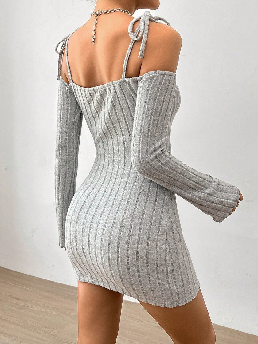 White FJØRNA shoulder tie-strap mini dress, stylish and cozy, featuring a fitted silhouette and adjustable straps.