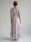 FJØRNA summer midi dress for women with floral pattern and square neckline, casual and stylish for warm weather.