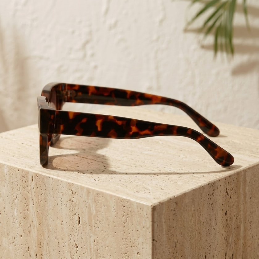 FJØRNA vintage rectangular unisex sunglasses with dark lenses and slim frame, accessory for women and men.