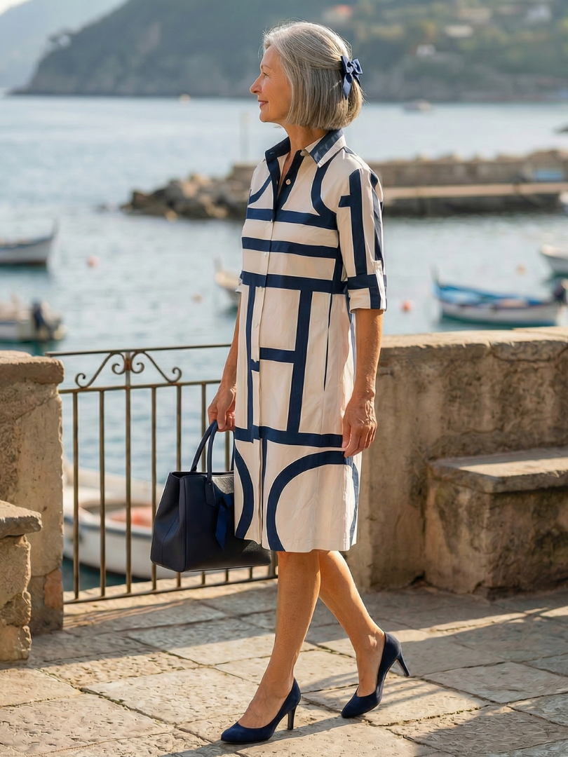 FJØRNA women's summer dress with geometric pockets, lightweight fabric, and stylish design perfect for warm weather.