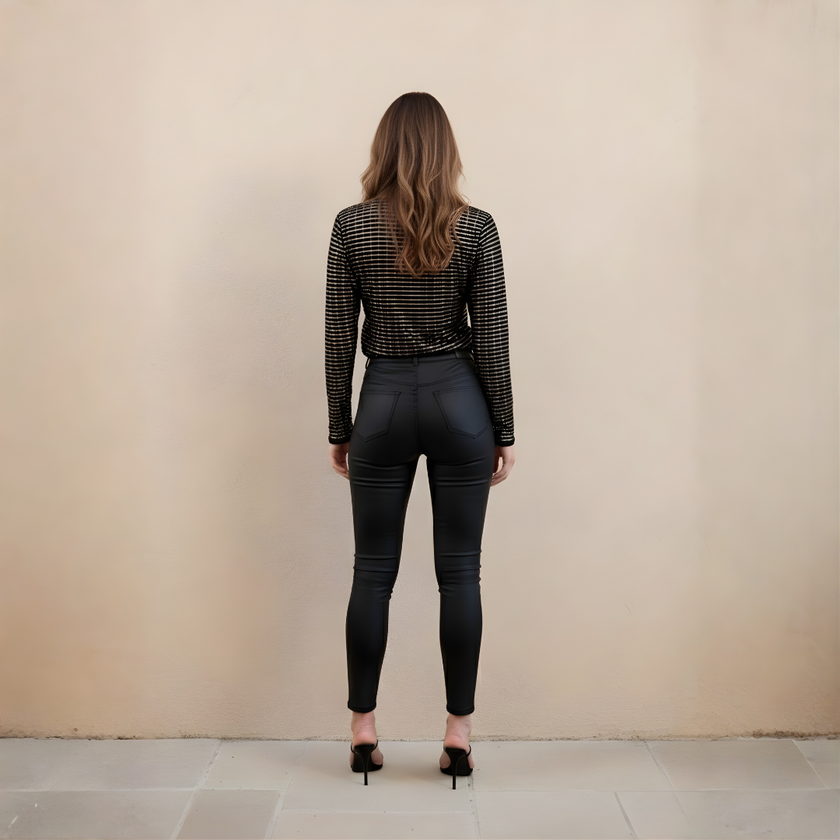 FJØRNA glitter long sleeve men's top, stylish and shimmering, shown on a model with a close-up of the sparkly fabric.