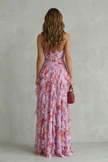 FJØRNA elegant floral maxi dress for women with halter neck, flowy fabric, perfect for summer or special occasions.