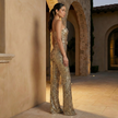 FJØRNA women's sequin flared jumpsuit with wide-leg pants, sparkling sequins, and a fitted bodice, stylish and eye-catching.