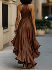 FJØRNA Midnight Elegance satin halter ruffle gown displayed on a mannequin, featuring a flowing design and intricate ruffle details.
