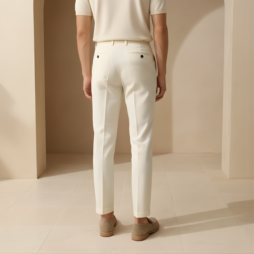 FJØRNA men's straight leg trousers with a relaxed fit, shown in a neutral color, tailored for comfort and style.