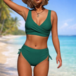 FJØRNA women's summer bikini with wrap design and tummy control, featuring vibrant swimwear fabric and adjustable straps.