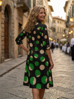 FJØRNA women's summer polka dot wrap dress, flowy and lightweight with a stylish design perfect for warm weather.
