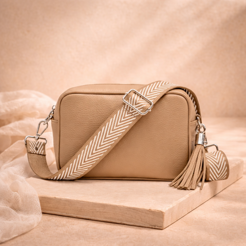 FJØRNA genuine leather chevron strap crossbody bag for women with stylish design and adjustable strap.