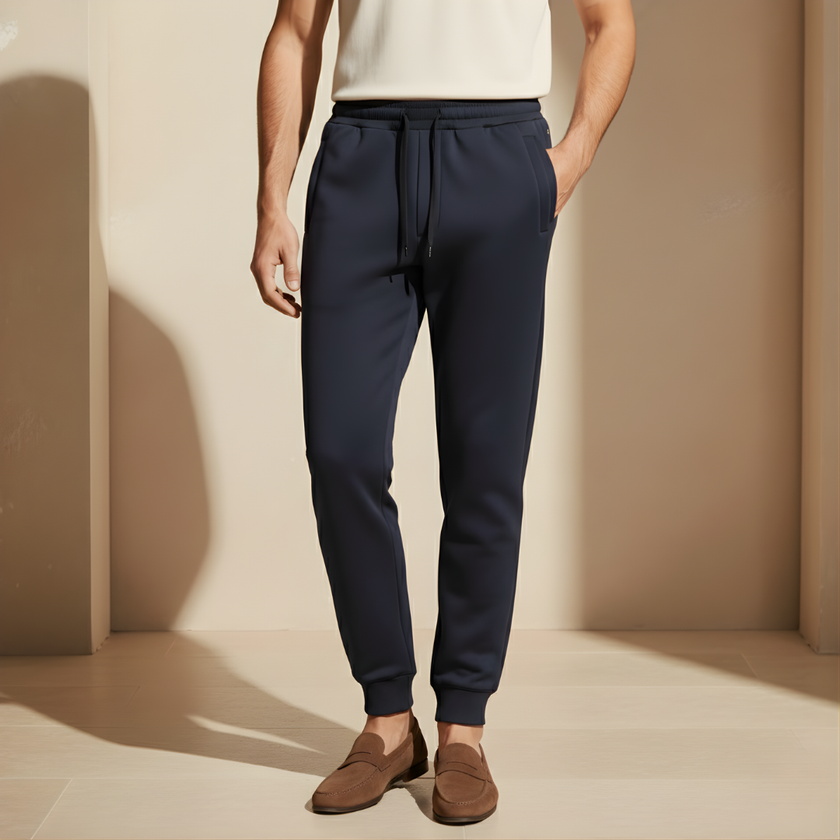 FJØRNA men's relaxed fit joggers with drawstring waist, soft fabric, and tapered pant design for comfortable casual wear