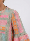 FJØRNA women's geometric tiered summer dress with sleeveless design and vibrant pattern, perfect for warm-weather wear.