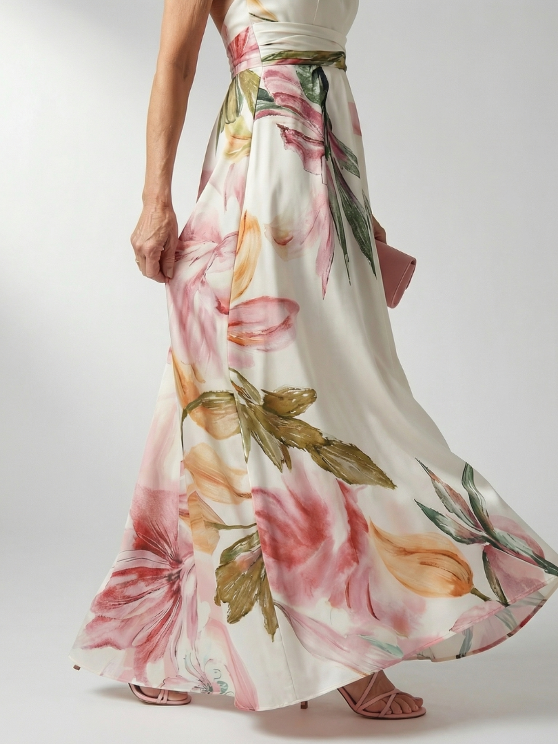 Floral summer maxi dress for women by FJØRNA featuring a halter neck and sleeveless relaxed fit, perfect for warm weather.