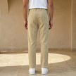 Men’s FJØRNA straight leg corduroy trousers, casual style, in a natural beige color, showing the fit and texture of the fabric.