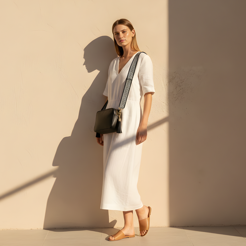 FJØRNA leather chevron strap genuine crossbody bag for women with textured design and adjustable strap.