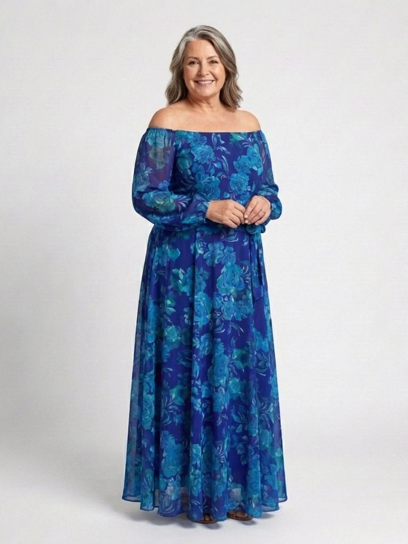 FJØRNA women's floral summer maxi dress, flowy and lightweight, with vibrant blossom patterns perfect for warm weather wear.