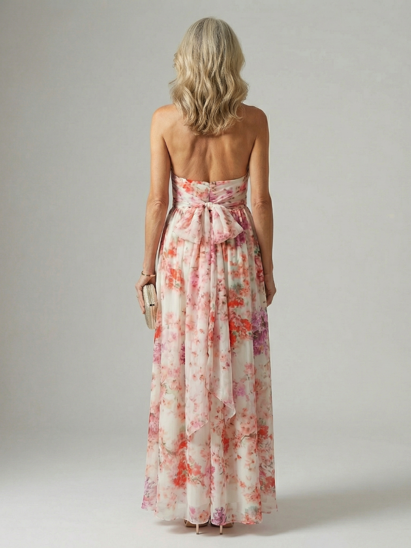 FJØRNA summer maxi dress for women with floral pattern, halter neck, sleeveless design, breathable lightweight fabric.