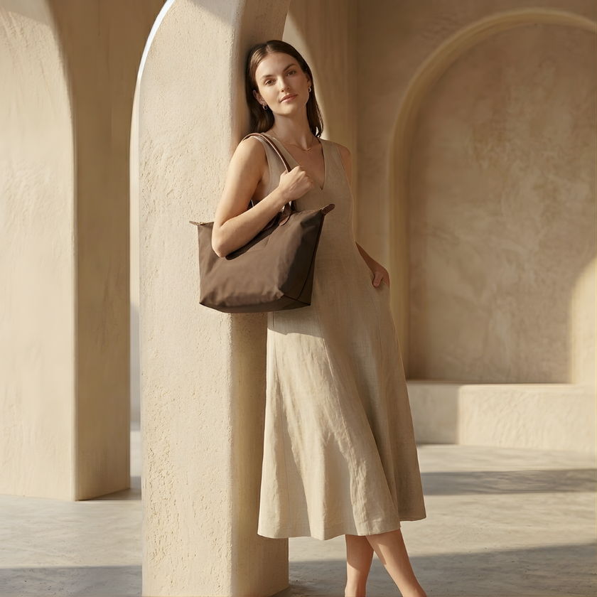 FJØRNA leather tote bag for women, large foldable design, stylish and spacious for everyday use, shown in natural leather finish.