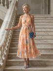 FJØRNA women's summer midi dress with halter neck, sleeveless, flowy lightweight fabric, perfect for warm weather.