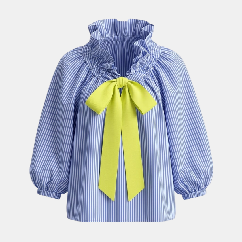 FJØRNA oversized long sleeve top for women, relaxed fit, soft fabric, in a neutral color, displayed on a hanger.
