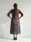 FJØRNA women's summer midi dress with long sleeves, wrap style, flowy fabric, perfect for warm weather wear.