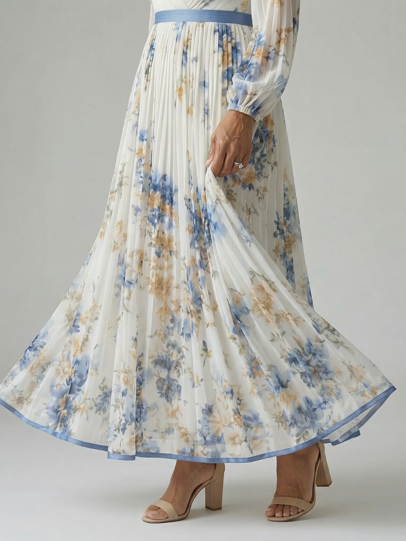 FJØRNA women's summer midi dress with floral pattern and long sleeves, perfect for warm weather and casual outings.