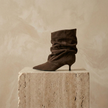 FJØRNA women's suede ankle boots with low heel and pointed toe, stylish footwear for casual or dressy outfits.