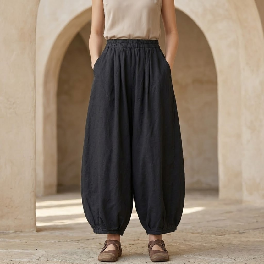 FJØRNA linen blend harem trousers for women with elastic waist, relaxed fit, and stylish comfortable design.