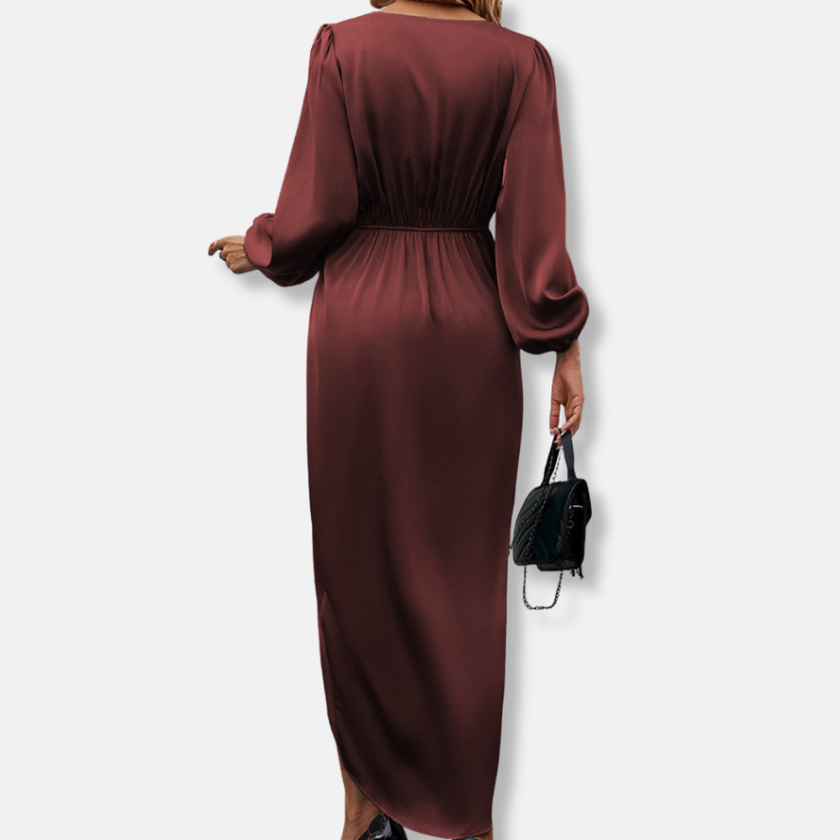 FJØRNA elegant midi dress for women with v-neck and long sleeves, showcased in a stylish, flowing design perfect for formal occasions.