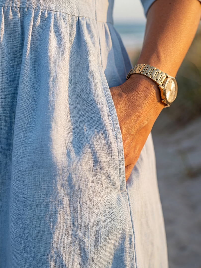 FJØRNA women's summer maxi dress with pockets, flowy and casual, featuring a relaxed fit and lightweight fabric.