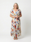 FJØRNA women's floral pleated summer midi dress with a flowing, lightweight fabric, perfect for warm-weather occasions.