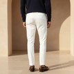 FJØRNA men's slim fit trousers, tailored pants in dark fabric, featuring a sleek, modern design and classic waistband.