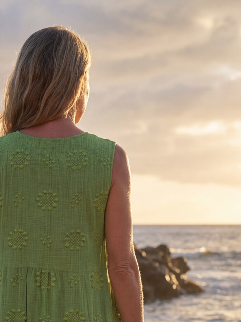 FJØRNA women's summer midi dress, sleeveless and flowy, lightweight breathable fabric, ideal for warm weather.