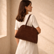 Vegan large suede handbag for women by FJØRNA, stylish and spacious with a sleek design and top handle.
