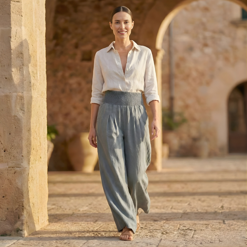 FJØRNA wide-leg high-waist elastic women's trousers, flowing fabric and relaxed fit, stylish and comfortable for everyday wear.