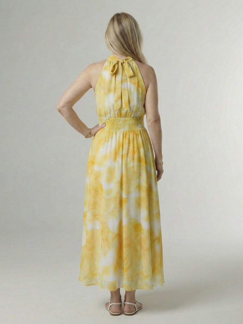 FJØRNA summer midi dress for women with halter neck and sleeveless casual design, perfect for warm weather wear.