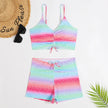FJØRNA women's printed tankini set with flattering fit, featuring colorful patterns and adjustable straps for comfortable swimwear.