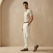 Men's linen blend straight leg trousers by FJØRNA, relaxed fit, casual pant style with visible waistband and relaxed fit silhouette.