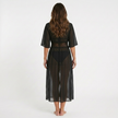 Women's FJØRNA tie waist cover-up maxi dress with breathable woven fabric, featuring a relaxed fit and elegant design.