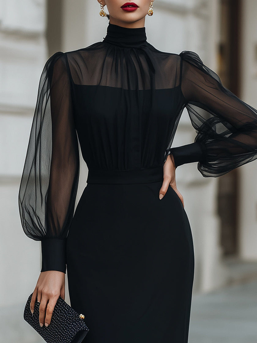 FJØRNA high-neck midi dress with sheer long sleeves, tailored fit, and elegant silhouette for sophisticated occasions.