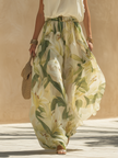 FJØRNA Lysandra white dress, elegant fluid dress for women, showcasing a stylish and sophisticated summer dress design.