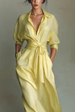 FJØRNA solid color lapel long sleeve casual maxi dress with pocket and waist-cinching design, perfect for everyday wear.