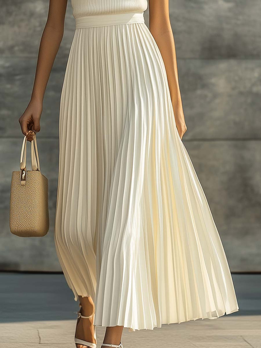 Cream chiffon pleated maxi dress by FJØRNA, casual dress with flowy fabric and elegant pleats, perfect for warm-weather occasions.