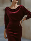 FJØRNA velvet boat-neck pencil dress for women, draped design, close-up of elegant black dress fabric and fitted silhouette