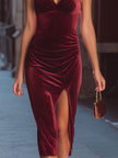 Wine-red velvet halter midi dress by FJØRNA featuring a fitted silhouette and elegant design, perfect for formal occasions.