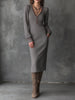 FJØRNA elegant bohemian ash taupe sculpted herringbone knit midi dress, showcasing its fitted silhouette and textured fabric.