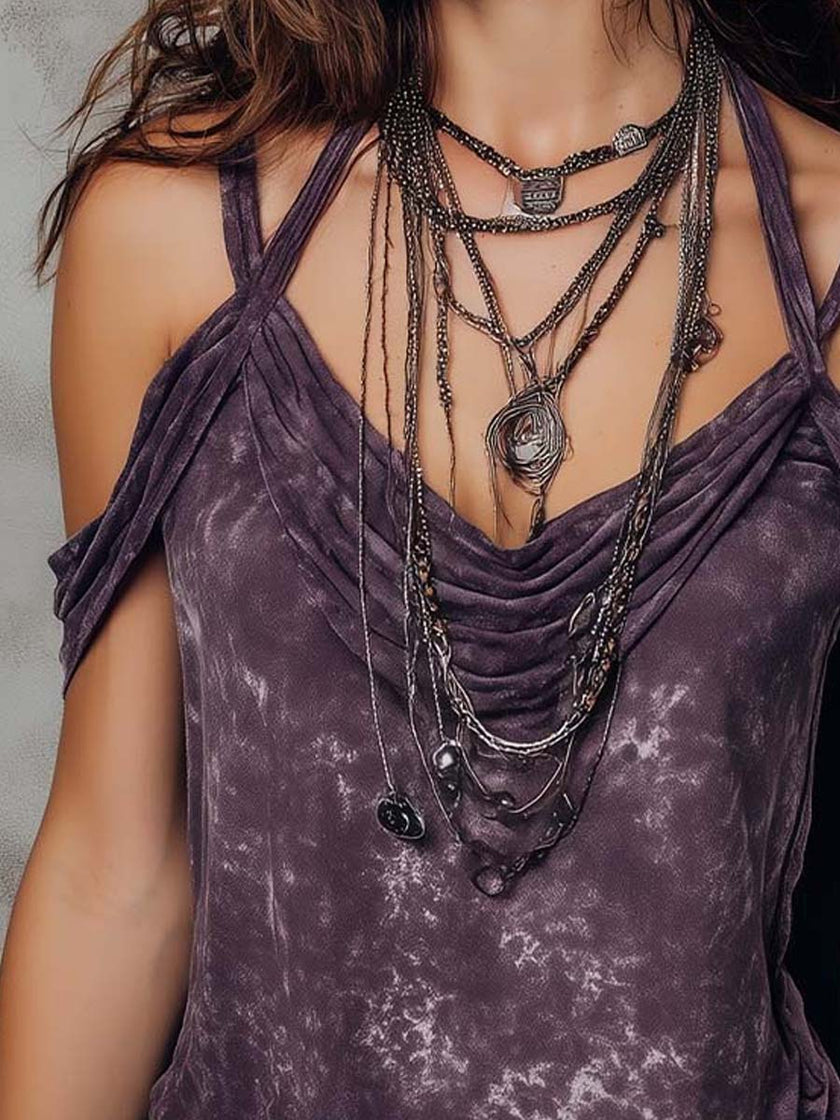 Purple boho tie-dye FJØRNA strappy cami top for women, short sleeve bohemian T-shirt with vibrant tie-dye pattern.