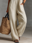 Women’s linen blend sleeveless jumpsuit with stand collar and embroidery detail, by FJØRNA, featuring stylish pants design.
