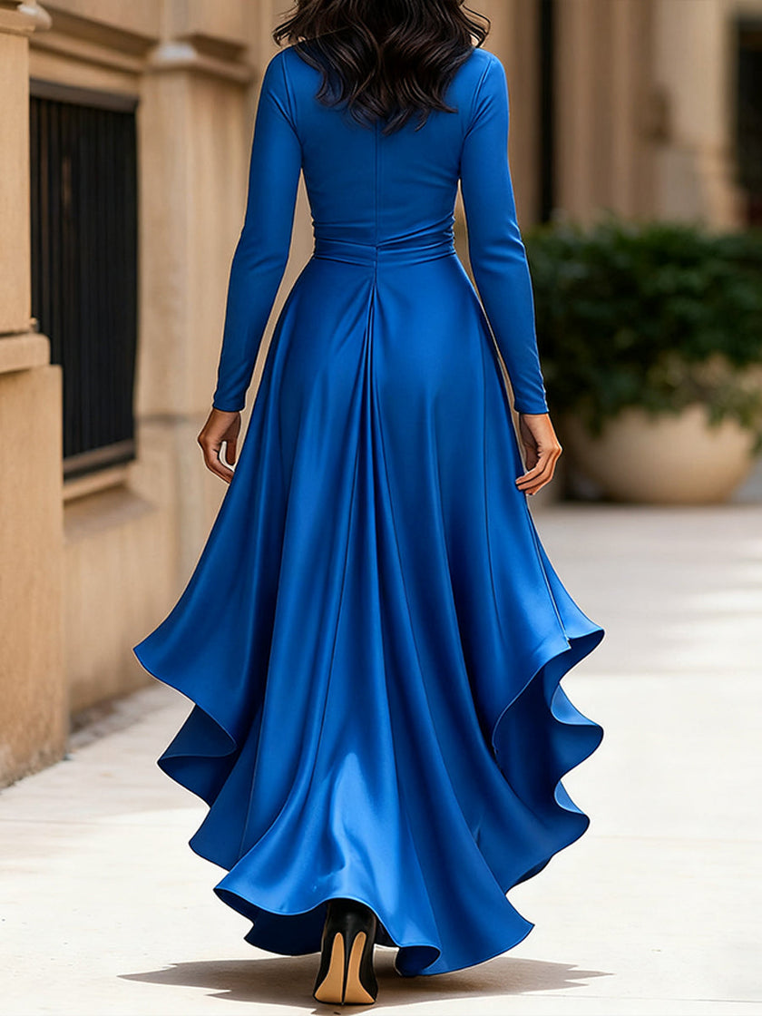 FJØRNA midnight blue satin maxi dress with draped fabric and ruffle details, perfect for elegant evening occasions.