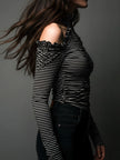 FJØRNA black striped high neck cold-shoulder ruched T-shirt with long sleeves and fitted style, casual and trendy top.