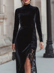 Black velvet turtleneck gown with lace slit by FJØRNA, featuring elegant lace details and a sleek, fitted silhouette.