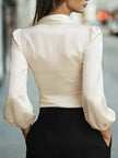 FJØRNA summer women's blouse with V-neck and long sleeves, lightweight top for warm weather, in soft fabric.